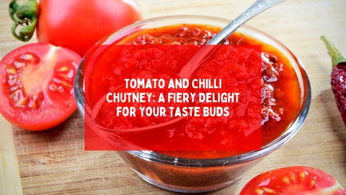 Tomato and chilli chutney in a glass bowl with fresh chillies